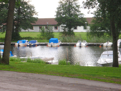 Boats docked on the river mouth.